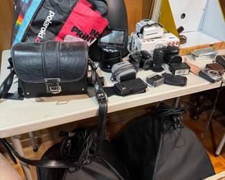 Assortment of camera equipment by GE, Koda, Minolta, Nikon