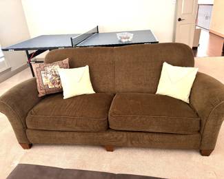 Plush brown roll arm sofa