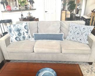 Two Pottery Barn grey micro fiber sofas