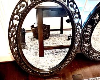 Black oval mirror