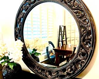 Large black round mirror