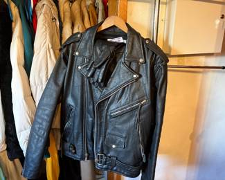 Leather motorcycle jacket, gloves and chaps.