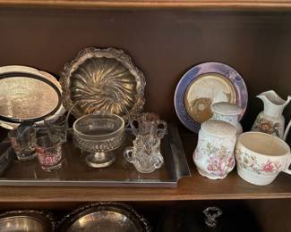 Vintage silverplate items, ceramic sugar, creamers and salt and pepper shakers.