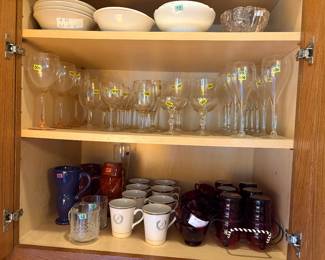 Wine glasses, mugs, glass cups, serving bowls.