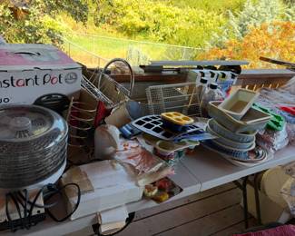 Instant Pot and other kitchen supplies. There are four more tables of kitchen items!