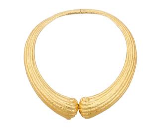 27 David Webb: An 18K Gold Choker Of a scrolling design featuring a hammered finish, signed David Webb Length: 16 in. 245.5 grams gross Estimate: $30,000 - $50,000