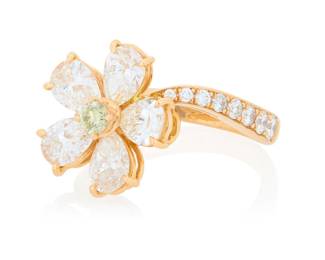 93 An 18K Rose Gold and Diamond Flower Ring Featuring a floral design set with pear-shaped diamond petals, centering a round colored diamond center and finished with graduated round diamonds Size: 6 3/4 6.1 grams gross Estimate: $5,500 - $6,500