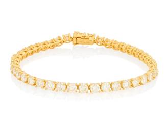 283 An 18K Gold and Diamond Bracelet Featuring forty round diamonds weighing approximately 8.85 carats Length: 7 in. 11.8 grams gross Estimate: $3,500 - $4,500