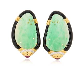 239 A Pair of 18K Gold, Jade and Gem-Set Earrings Centering carved jade tablets of an organic design encased by carved onyx, accented by round diamonds and finished with two oval ruby cabochons 2 pieces Measures: 1 1/2 x 1 in. 26.8 grams gross Estimate: $2,500 - $3,500