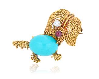 2 An 18K Gold and Turquoise Pendant/Brooch Of a dog design featuring an oval turquoise cabochon, accented by a single round diamond and round ruby cabochon, signed Italy Measures: 2 1/4 (with bail) x 1 1/8 in. 13.9 grams gross Estimate: $2,000 - $3,000