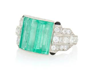 122 An Art Deco Platinum, Emerald and Diamond Ring Centering five elongated baguette emeralds weighing approximately 5.40 carats, accented by four round onyx cabochons and old European-cut diamonds weighing approximately 1.05 carats, c.1935 Size: 7 1/4 10.0 grams gross Estimate: $3,000 - $5,000