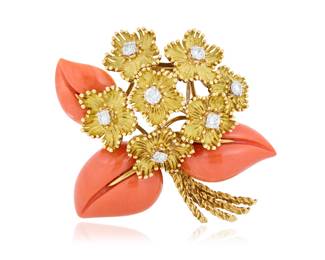 32 A French 18K Gold, Diamond and Coral Brooch Of flower motif design, set with round brilliant-cut diamonds weighing approximately 0.70 carat total Measures: 2 x 2 in. 25.9 grams gross Estimate: $4,000 - $6,000