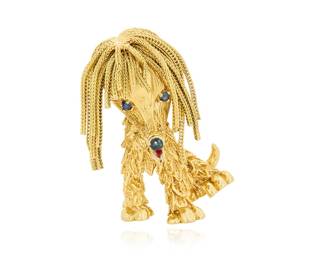 152 An 18K Gold and Enamel Brooch Of a long-haired dog design featuring dangling braided chain, two round sapphire eyes and an enamel tongue and nose Measures: 1 1/2 x 1 in. 20.3 grams gross Estimate: $2,500 - $3,500