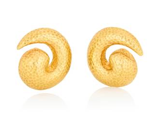 26 A Pair of 18K Gold Earrings Of a hammered swirled design 2 pieces Measures: 1 x 1 in. 20.0 grams gross Estimate: $1,800 - $2,500