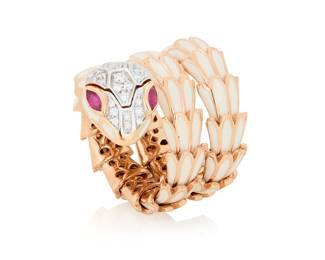 87 Alexis NY: An 18K Rose Gold-Plated, Sterling Silver, and Enamel Snake Ring Of an expandable snake design featuring white enamel scales accented by two ruby eyes and round diamonds, signed Alexi NY, 052552 Size: 5 1/2 18.7 grams gross Estimate: $1,800 - $2,500
