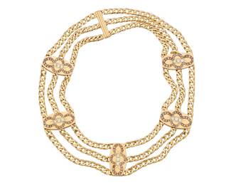 214 Boucheron: An 18K Gold and Colored Diamond Necklace Featuring three Cuban link chains accented by fancy link stations set with round yellow and brown diamonds weighing approximately 6.95 carats, signed Boucheron. PC928329 Length: 14 -15 in. 143.7 grams gross Estimate: $20,000 - $30,000