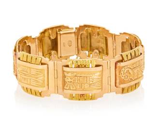 277 An 18K Bi-Color Gold Bracelet Featuring Aztec motif links of rose gold, accented by textured yellow gold Length: 7 in., Width: 7/8 in. 64.8 grams gross Estimate: $4,000 - $6,000