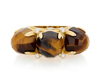 145 Aletto Brothers: An 18K Gold and Tiger's Eye Ring Featuring three faceted tigers eye cabochons, accented by eight round diamonds, signed Aletto bros Size: 7 14.2 grams gross Estimate: $3,000 - $5,000