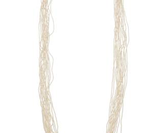 233 An 18K White Gold, Seed Pearl and Diamond Necklace Featuring fourteen strands of seed pearl beads, finished with an 18k white gold and multiring element accented by round diamonds weighing approximately 1.25 carats Length: 34 1/2 in. 55.1 grams gross Estimate: $6,000 - $8,000