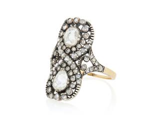 116 A Silver Topped-Gold and Rose-Cut Diamond Ring Featuring an ornate infinity design centering two pear-shaped rose-cut diamond, accented by round rose-cut diamonds Size: 7 3/4 7.4 grams gross Estimate: $3,500 - $5,500