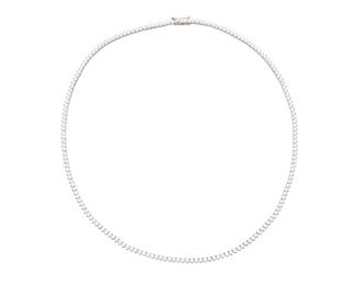 253 An 18K White Gold and Diamond Necklace Featuring slightly graduated round diamonds weighing approximately 6.00 carats Length: 16 1/2 in. 13.6 grams gross Estimate: $3,500 - $5,500