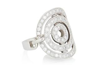40 Bulgari: An 18K White Gold and Diamond 'Astrale Cerchi' Ring Designed featuring three nested circles set with round diamonds weighing approximately 1.20 carats, finished with a stirrup motif shank, signed Bulgari, with Italian workshop marks Size: 6 1/4 9.4 grams gross Estimate: $2,800 - $3,500