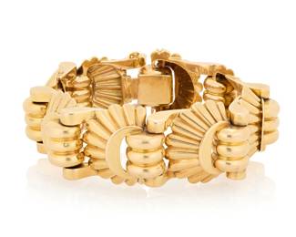 270 An 18K Gold Bracelet Featuring a geometric nested link design, with French import marks Length: 8 in., Width: 1 in. 85.0 grams gross Estimate: $9,000 - $12,000