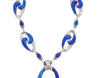 186 An 18K White Gold, Lapis Lazuli and Diamond Necklace Including a chain featuring swirling carved elements of lapis lazuli contrasted by round diamonds, suspending a central pendant including carved graduated lapis lazuli and round diamonds, estimated total diamond weight 5.50 carats, signed with French assay and maker's marks Chain: 16 in, Pendant: 2 1/4 in. 144.1 grams gross Estimate: $12,000 - $18,000