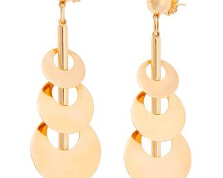 133 A Pair of 18K Gold Earrings Featuring graduated concentric discs in a high polish design, with makers' mark, no. 7076 Measures: 3 1/4 x 1 1/8 in. 35.5 grams gross Estimate: $4,500 - $5,500