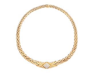 256 An 18K Gold and Diamond Necklace Featuring a fancy braided link chain, centering a high polish gold element accented by round diamonds weighing approximately 0.75 carat, with French assay marks Length: 16 in. 54.0 grams gross Estimate: $8,000 - $12,000