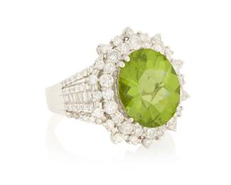 108 A 14K White Gold, Peridot and Diamond Ring Centering an oval mixed-cut peridot weighing approximately 8.60 carats, accented by round and baguette diamonds weighing approximately 2.46 carats Size: 9 1/2 9.9 grams gross Estimate: $2,500 - $3,500