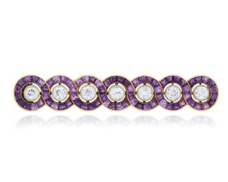281 Cartier: A 14K Bi-Color Gold, Amethyst and Diamond Brooch Centering seven old European-cut diamonds encircled by a woven design set with tapered amethyst baguettes, signed Cartier, Paris, New York Measures: 2 x 3/8 in. 7.8 grams gross Estimate: $6,000 - $8,000