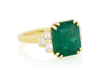 170 A 18K Gold, Emerald and Diamond Ring Featuring an emerald-cut emerald weighing approximately 6.15 carats, accented by round diamonds weighing approximately 0.78 carat total Size: 7 1/2 7.6 grams gross Estimate: $6,000 - $8,000