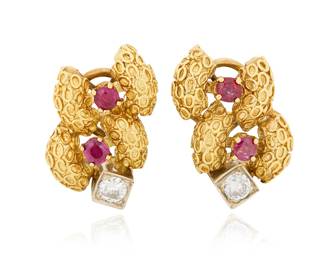 201 A Pair of 18K Gold, Ruby and Diamond Earrings Featuring a tentacle texture motif, accented by four round rubies and two round diamonds 2 pieces Measures: 7/8 x 1/2 in. 13.6 grams gross Estimate: $1,800 - $2,500