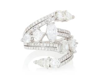110 An 18K White Gold and Diamond Ring Of a bypass design featuring round, oval, pear-shaped and princess-cut diamonds weighing approximately 4.14 carats accented by round diamonds weighing approximately 0.75 carat Size: 6 1/2 11.2 grams gross Estimate: $3,500 - $4,500
