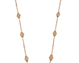 288 Judith Ripka: An 18K Rose Gold, Smoky Quartz and Diamond Necklace Of a station design featuring eight oval faceted smoky quartz accented by round diamonds, signed JR Length: 34 in. 48.0 grams gross Estimate: $5,000 - $7,000