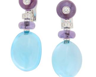 39 Bulgari: A Pair of 18K White Gold and Gem-Set 'Mediterranean Eden Sassi' Earrings Featuring polished blue topaz drops measuring approximately 17.14 x 13.00 mm, topped with polished amethyst beads, accented by round diamond, signed Bulgari with Italian workshop marks 2 pieces Measures: 1 1/2 x 5/8 in. 20.1 grams gross Estimate: $3,500 - $5,500