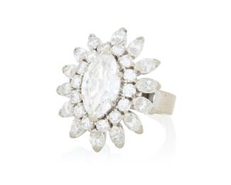 109 A 14K White Gold and Diamond Ring Centering a modified marquise-shaped diamond weighing 1.69 carats, accented by two rows of round and marquise-shaped diamonds weighing approximately 1.95 carats Size: 5 9.7 grams gross Accompanied by a GIA Report numbered #2235993305, dated July 07, 2026, stating the diamond as Natural with a color grade of G and a clarity grade of VS1, faint fluorescence. This lot is offered at no reserve. Estimate: $4,000 - $6,000