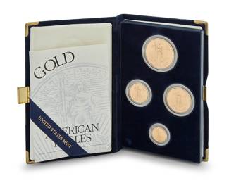 299 A 22K Gold American Eagle Coin Proof Set Including a Fifty Dollar, Twenty-five Dollar, Ten dollar and Five dollar coin 4 pieces 57.47 grams gross Estimate: $5,000 - $8,000
