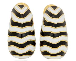 165 David Webb: A Pair of 18K Gold and Enamel 'Zebra' Earrings Featuring organic alternating black and white enamel stripes, signed Webb 2 pieces Measures: 1 x 1/2 in. 32.1 grams gross Estimate: $5,000 - $7,000