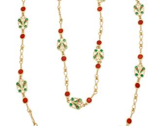 209 A 14K Gold and Plique-à-Jour Enamel Necklace Featuring fancy links of twisted gold, accented by butterfly motifs of red and green plique-a-jour enamel Length: 39 in. 69.5 grams gross Estimate: $7,000 - $10,000