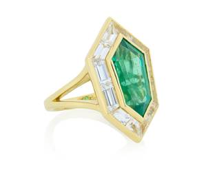 261 An 18K Gold, Emerald and Diamond Ring Centering an elongated shield shaped emerald weighing approximately 4.75 carats, framed by channel set white sapphire weighing approximately 3.45 carats Size: 6 3/4 11.3 grams gross Accompanied by GIA report Estimate: $15,000 - $20,000