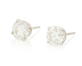 161 A Pair of Platinum and Diamond Stud Earrings Centering two round brilliant-cut diamond weighing 1.50 and 1.53 carats 2 pieces Measures: 1/4 in. 2.6 grams gross Accompanied by a GIA Report numbered #2175545568, dated March 24, 2016, stating the diamond as Natural with a color grade of H and a clarity grade of VS1, no fluorescence. Accompanied by a GIA Report numbered #2175545557, dated March 24, 2016, stating the diamond as Natural with a color grade of H and a clarity grade of VS1, no fluorescence. Estimate: $8,000 - $12,000
