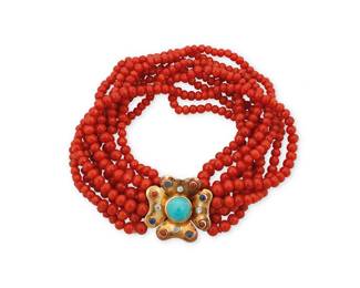 31 An 18K Gold, Coral and Gem-Set Bracelet Featuring eight strands of graduated coral beads measuring approximately 3.25 - 5.40 mm, a gold floral clasp accented by turquoise, coral and sapphire cabochons, finished with four round diamonds Length: 7 in. 56.0 grams gross Estimate: $1,800 - $2,500