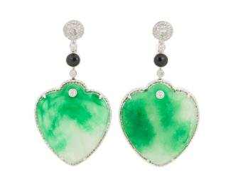 70 A Pair of 18K White Gold, Jade, Onyx and Diamond Earrings Suspending two heart-shaped jade cabochons measuring approximately 32.00 x 26.00 x 3.66 mm, accented by two onyx cabochons and finished with rose-cut and round diamonds 2 pieces Measures: 2 1/4 x 1 1/8 in. 27.6 grams gross Estimate: $1,800 - $2,500