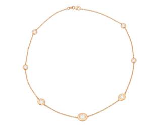 92 An 18K Rose Gold and Diamond Necklace Of a station design featuring seven graduated diamonds weighing approximately 3.40 carats Length: 16 in. 7.1 grams gross Estimate: $10,000 - $15,000