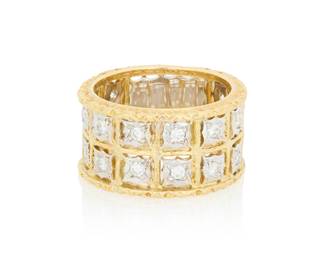 35 Buccellati: An 18K Bi-Color Gold and Diamond Ring Of a celestial design featuring two rows of white gold star motifs set with round diamonds, finished with etched yellow gold framing, signed M. Buccellati Size: 6 1/4 10.0 grams gross Estimate: $2,500 - $3,500