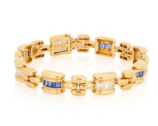155 An 18K Gold, Sapphire and Diamond Bracelet, Italy Featuring high polish links set with alternating sapphire and diamond baguettes Length: 7 1/2 in., Width: 3/8 in. 37.6 grams gross Estimate: $4,500 - $6,500