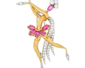 294 An 18K Bi-Color Gold, Ruby and Diamond Brooch Featuring a ballerina in motion, set with marquise-shaped and pear-shaped rubies. finished with round diamonds weighing approximately 1.35 carats Measures: 2 3/4 x 1 in. 18.6 grams gross Estimate: $3,500 - $5,500