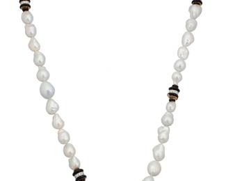 66 David Webb: An 18K Bi-Color Gold, Baroque Pearl and Onyx Necklace Featuring baroque cultured pearls measuring approximately 13.2 - 20.7 mm, accidented by onyx rondelles accented by round diamonds weighing approximately 4.20 carats, signed David Webb, can be worn as one or two nested necklaces 2 pieces Length: 16 in. and 18 in., or 34 in. 297.7 grams gross Estimate: $25,000 - $35,000